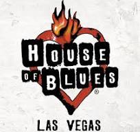 A white heart with flames on it and the words house of blues las vegas.