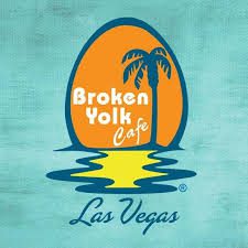 A blue background with the words " broken yolk cafe las vegas ".